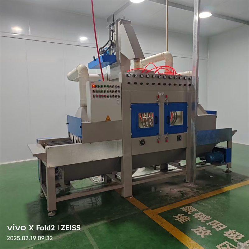 Through-feed sandblasting machine